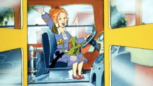 Young Girl Sits in the Bus Driver