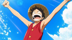 Anime Character Luffy from One Piece Cheers with Arms Raised Against a Bright Blue Sky Wearing a Red Vest and Straw Hat Angle Upshot