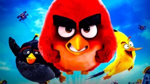 Three Angry Birds Charactersred Black and Yellowflying Toward the Camera with a Blue Sky Backdrop