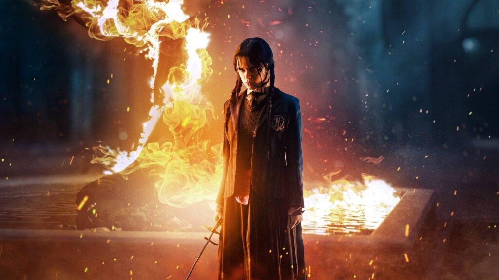 Young Woman in a School Uniform Standing with a Sword Surrounded by Flames and Embers in a Dark Scene