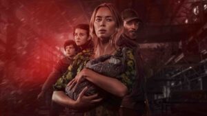 a Woman Cradles a Baby While a Man and Two Kids Stand Behind Them in a Tense Smoky Industrial Setting with Red Lighting