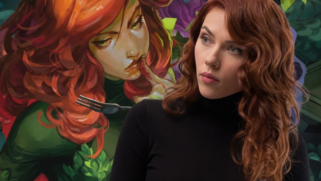 Woman with Wavy Red Hair in a Black Turtleneck Posing in Front of a Colorful Mural Featuring a Red haired Figure with a Fork Near the Lips