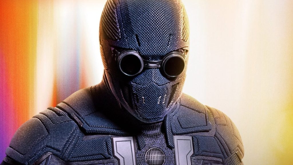 Close up of a Dark Textured Armored Figure Wearing Round Black Goggles and a Helmet like Suit