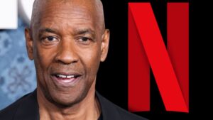 Close up Portrait of a Smiling Man Next to a Large Red Netflix Logo on a Black Background