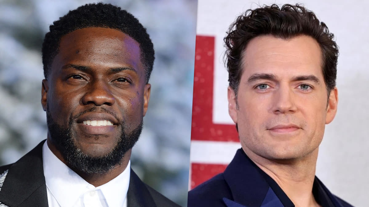 Two Male Celebrities Posing Side by Side at a Red Carpet Idris Elba on the Left in a Black Suit and White Shirt Henry Cavill on the Right in a Dark Suit