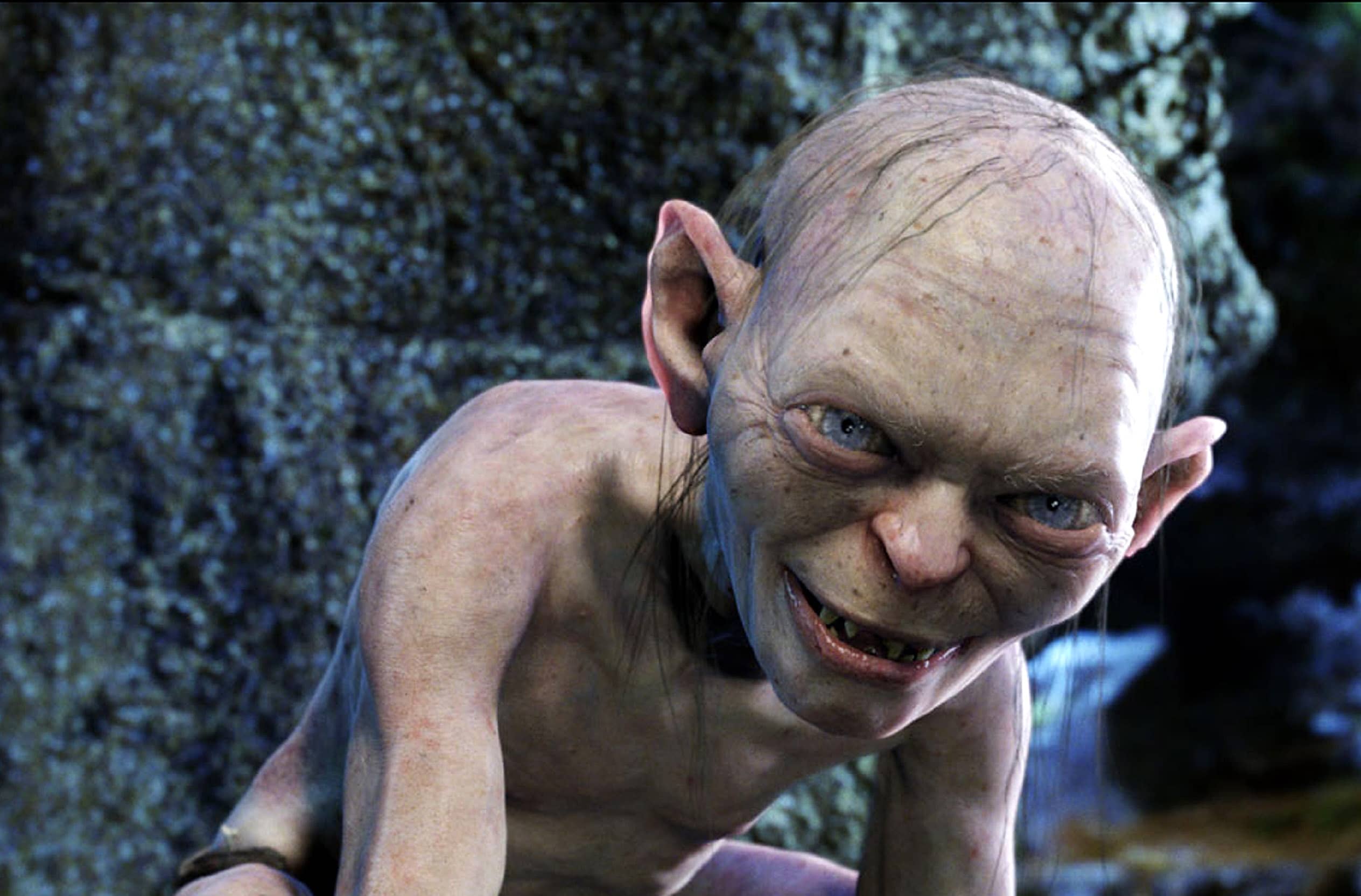 Close up of a Pale skinned Person with a Wide Unsettling Smile and Dirt on the Skin Leaning Toward the Camera Outdoors