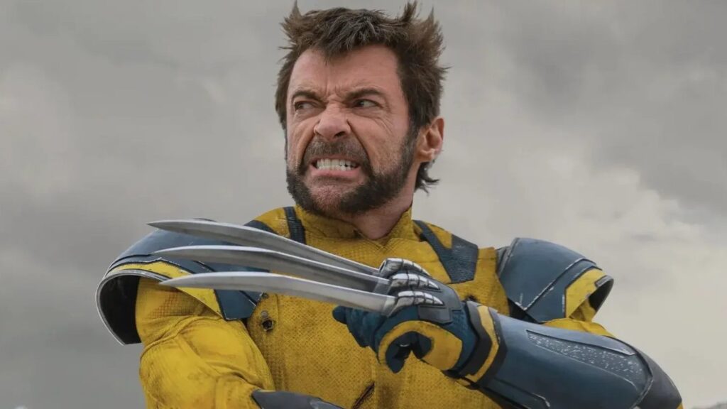 Wolverine in a Yellow Suit Snarling with Claws Extended Against a Cloudy Sky Ready to Strike