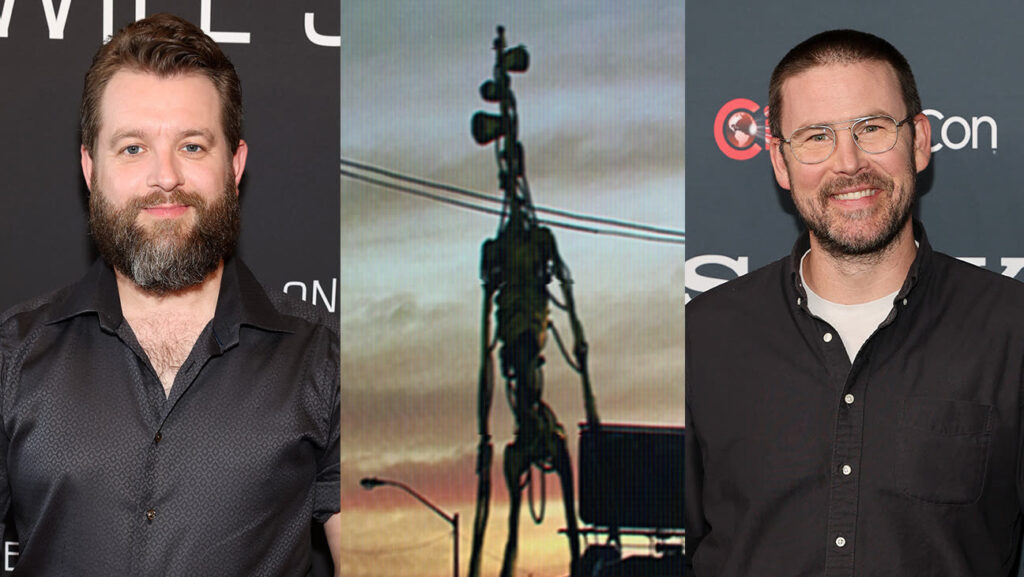 Bearded Man in a Dark Button up Shirt on the Left Central Artwork Featuring a Tall Skeletal Sculpture Against a Sunset and a Bearded Man with Glasses in a Dark Shirt on the Right at Event Photos